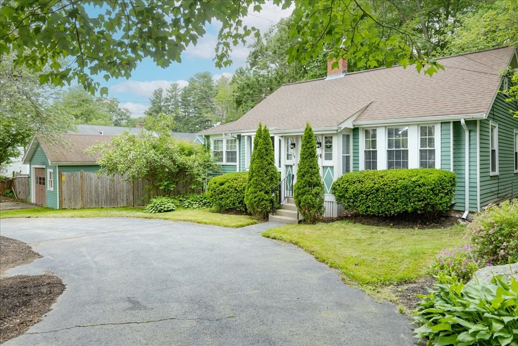 14 Francis Wyman Road Burlington, MA 01803 - Photo 2 of 39 a view of a house with garden and large trees