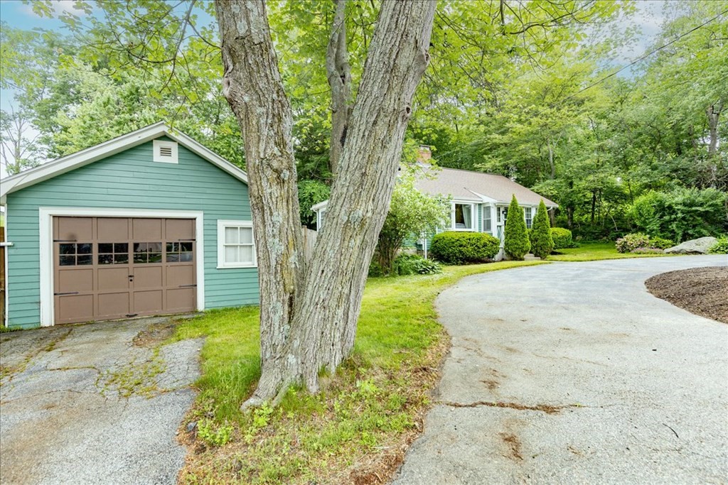14 Francis Wyman Road Burlington, MA 01803 - Photo 3 of 39 a front view of a house with garden