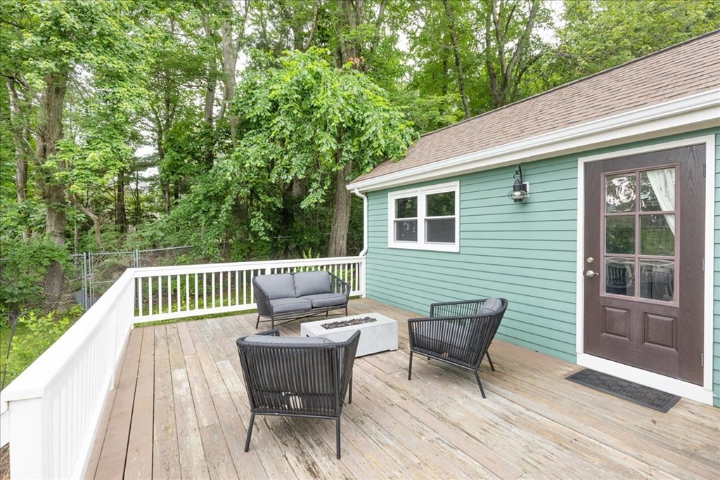 14 Francis Wyman Road Burlington, MA 01803 - Photo 31 of 39 a view of a chair and table on the deck