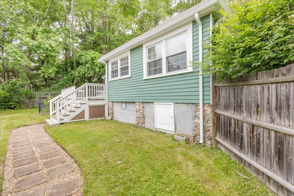14 Francis Wyman Road Burlington, MA 01803 - Photo 32 of 39 a front view of a house with a yard