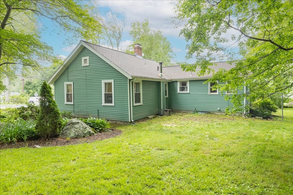 14 Francis Wyman Road Burlington, MA 01803 - Photo 37 of 39 a view of a backyard with potted plants and large tree