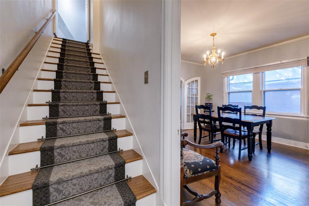 5407 Merrimac Avenue Dallas, TX 75206 - Photo 14 of 26 a view of a dining room with furniture and wooden floor