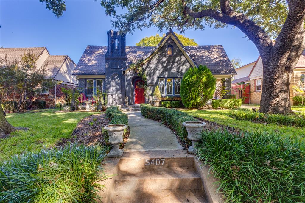 5407 Merrimac Avenue Dallas, TX 75206 - Photo 26 of 26 a view of a building with a yard and plants