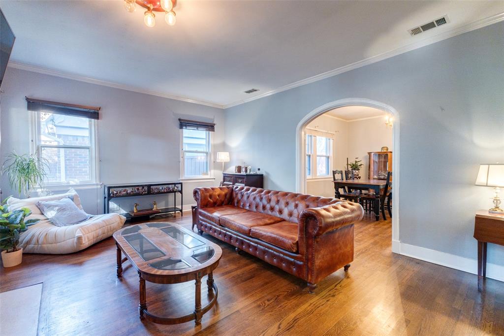 5407 Merrimac Avenue Dallas, TX 75206 - Photo 4 of 26 a living room with furniture and a large window