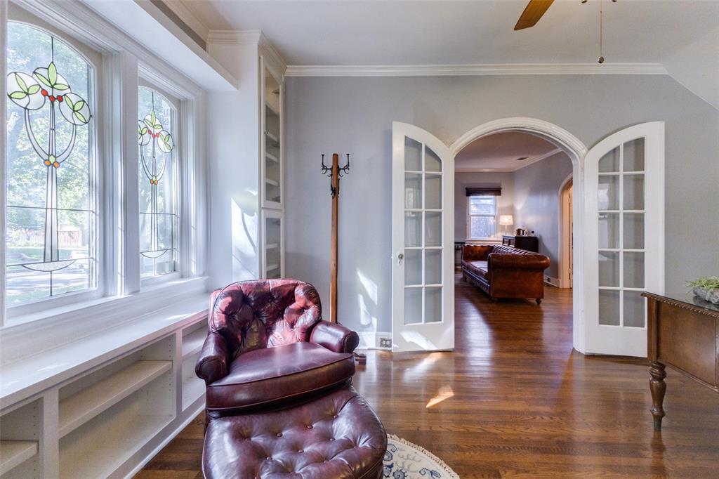 5407 Merrimac Avenue Dallas, TX 75206 - Photo 5 of 26 a living room with furniture and a large window