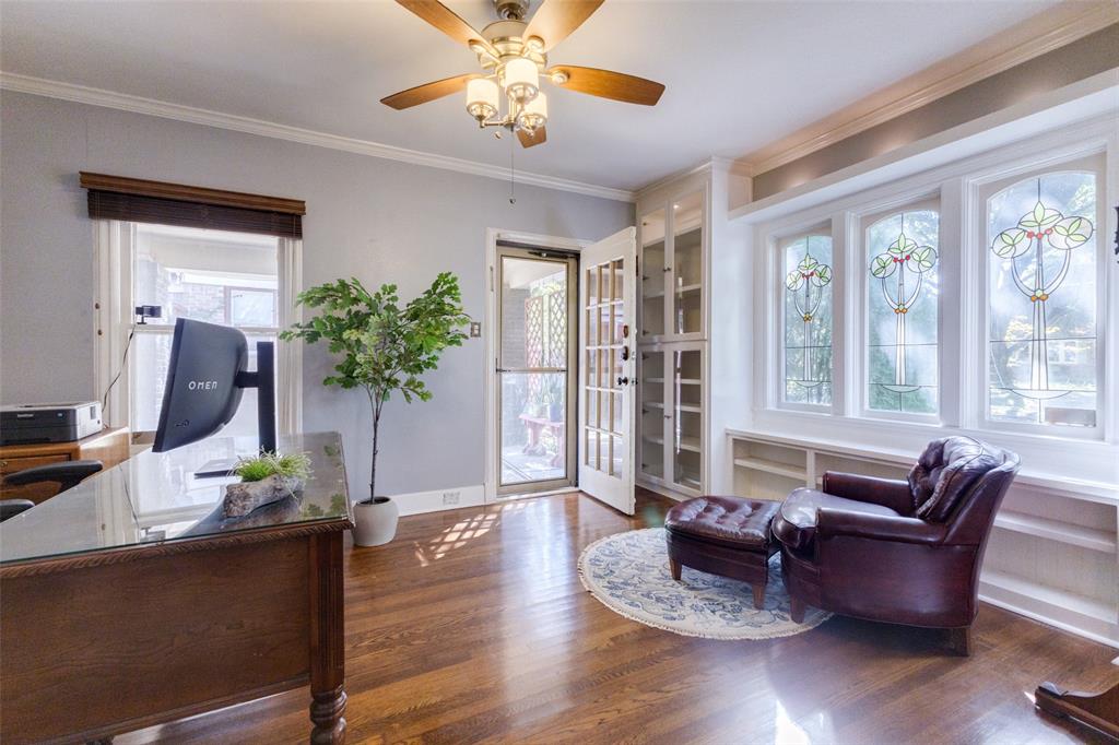 5407 Merrimac Avenue Dallas, TX 75206 - Photo 6 of 26 a living room with furniture and a large window