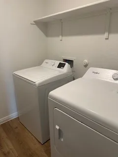 a utility room with dryer and washer