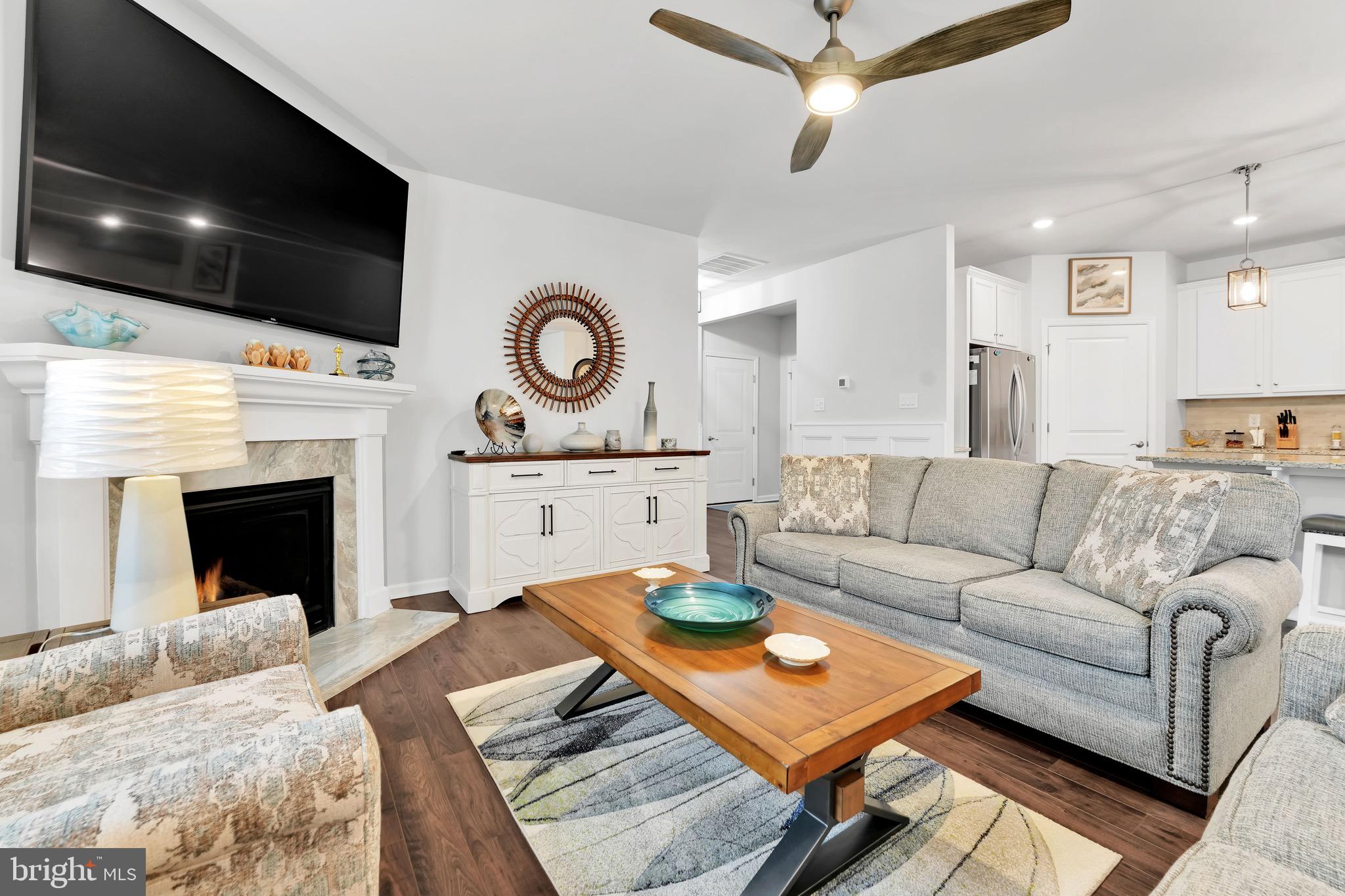 127 Raccoon Lane Barnegat, NJ 08005 - Photo 11 of 19 a living room with furniture and a flat screen tv