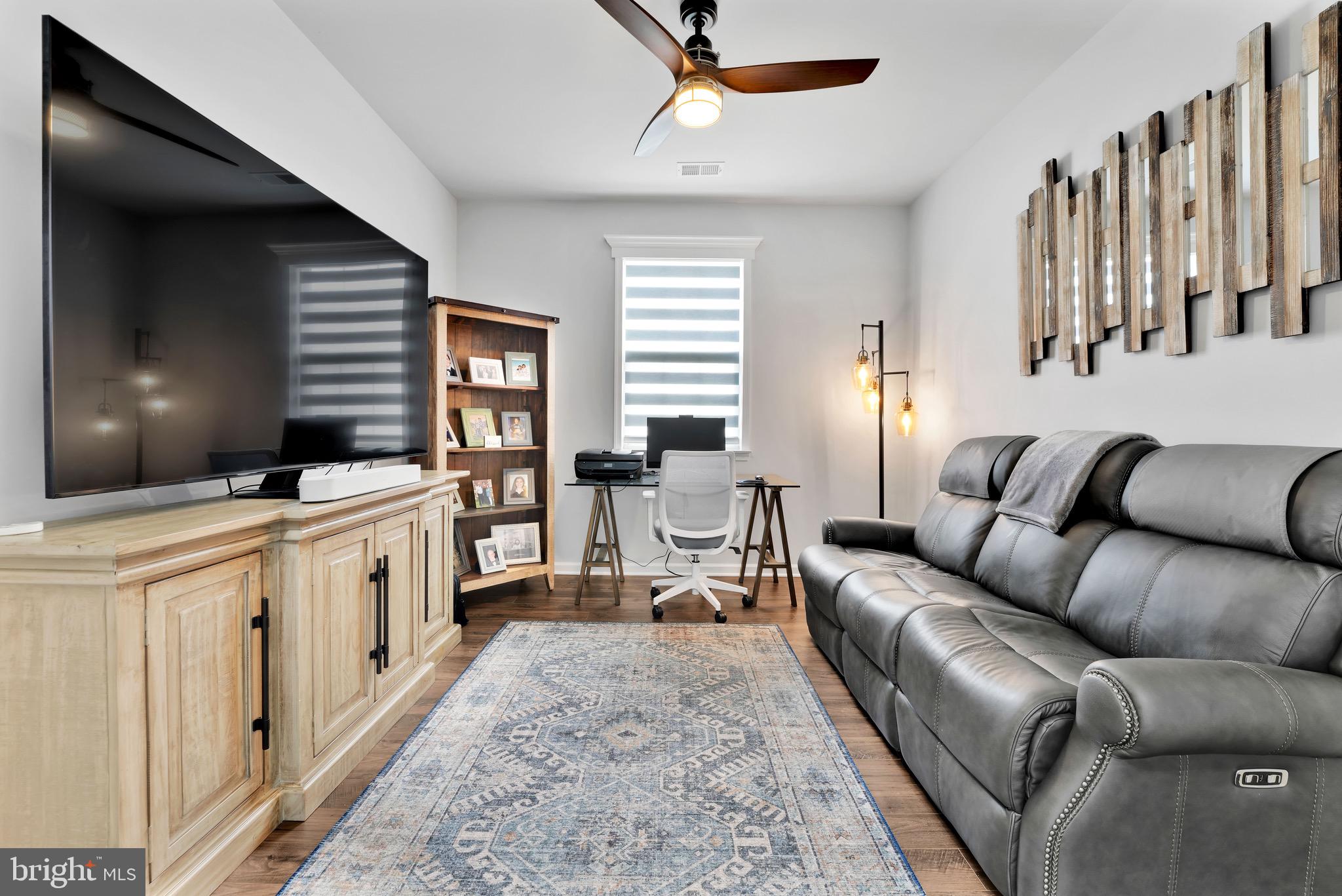 127 Raccoon Lane Barnegat, NJ 08005 - Photo 3 of 19 a living room with furniture and a large window