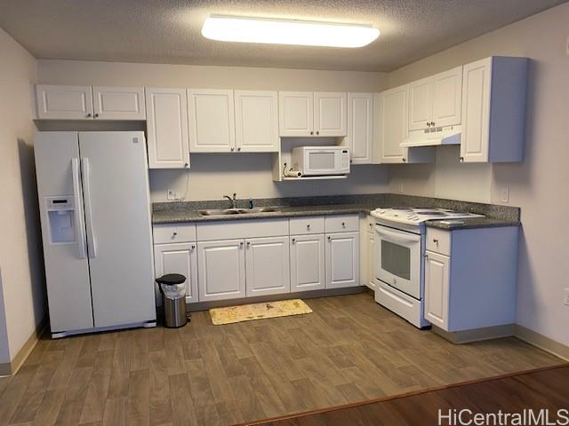 801 South Street, Unit 503 Honolulu, HI 96813 - Photo 2 of 12 a kitchen with stainless steel appliances a stove a sink and a refrigerator