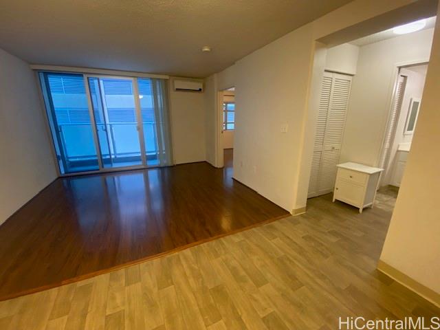 801 South Street, Unit 503 Honolulu, HI 96813 - Photo 3 of 12 a view of a room with wooden floor and a bathroom