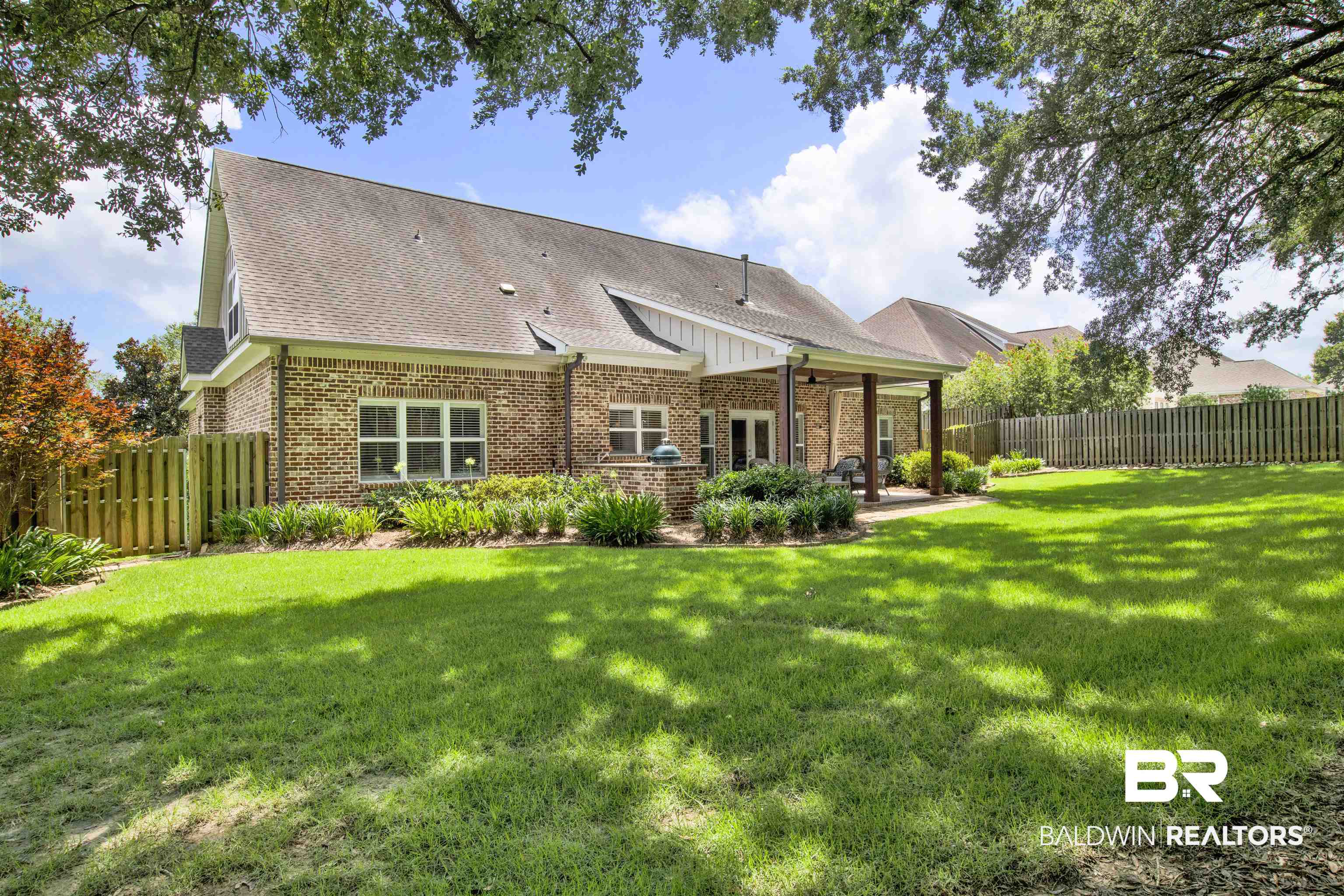 131 Sedgefield Avenue Fairhope, AL 36532 - Photo 39 of 50 Back of house featuring a lawn