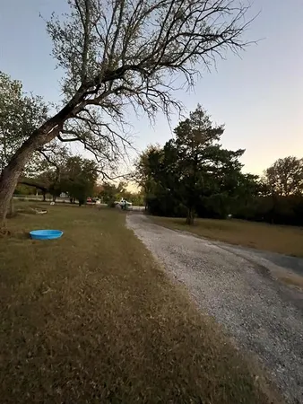 a view of outdoor space and yard