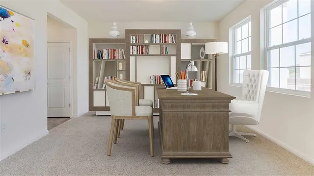 a room with a table and chairs