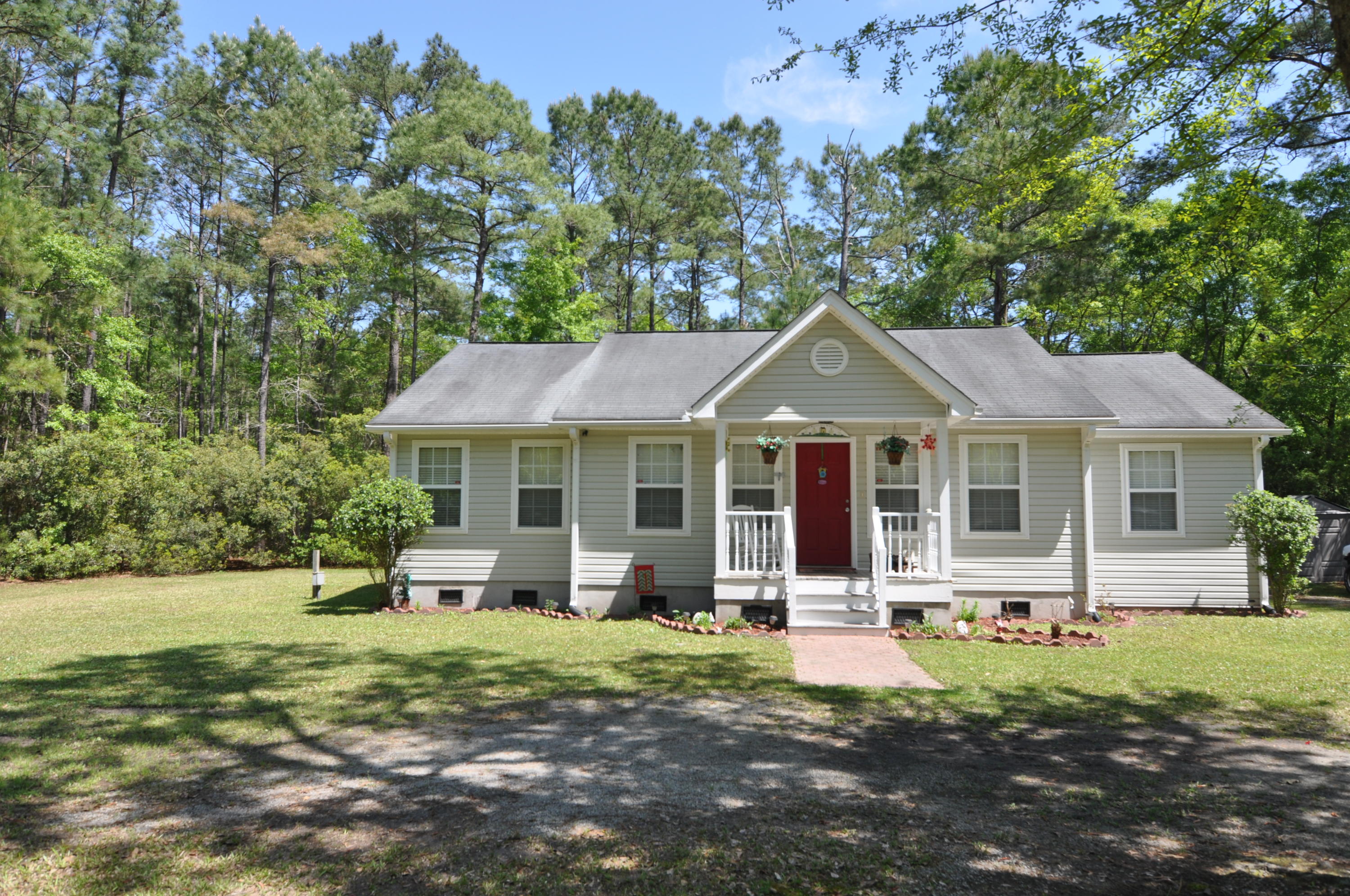 4256 Sebago Road Meggett, SC 29449 - Photo 1 of 21 Front of home