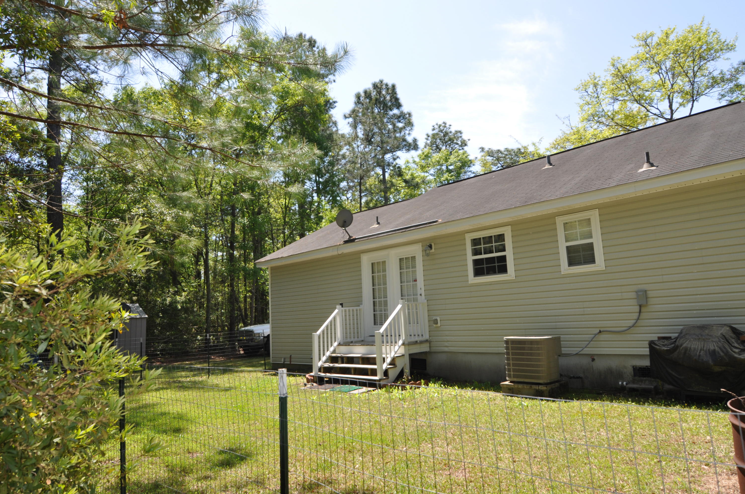 4256 Sebago Road Meggett, SC 29449 - Photo 3 of 21 back of home