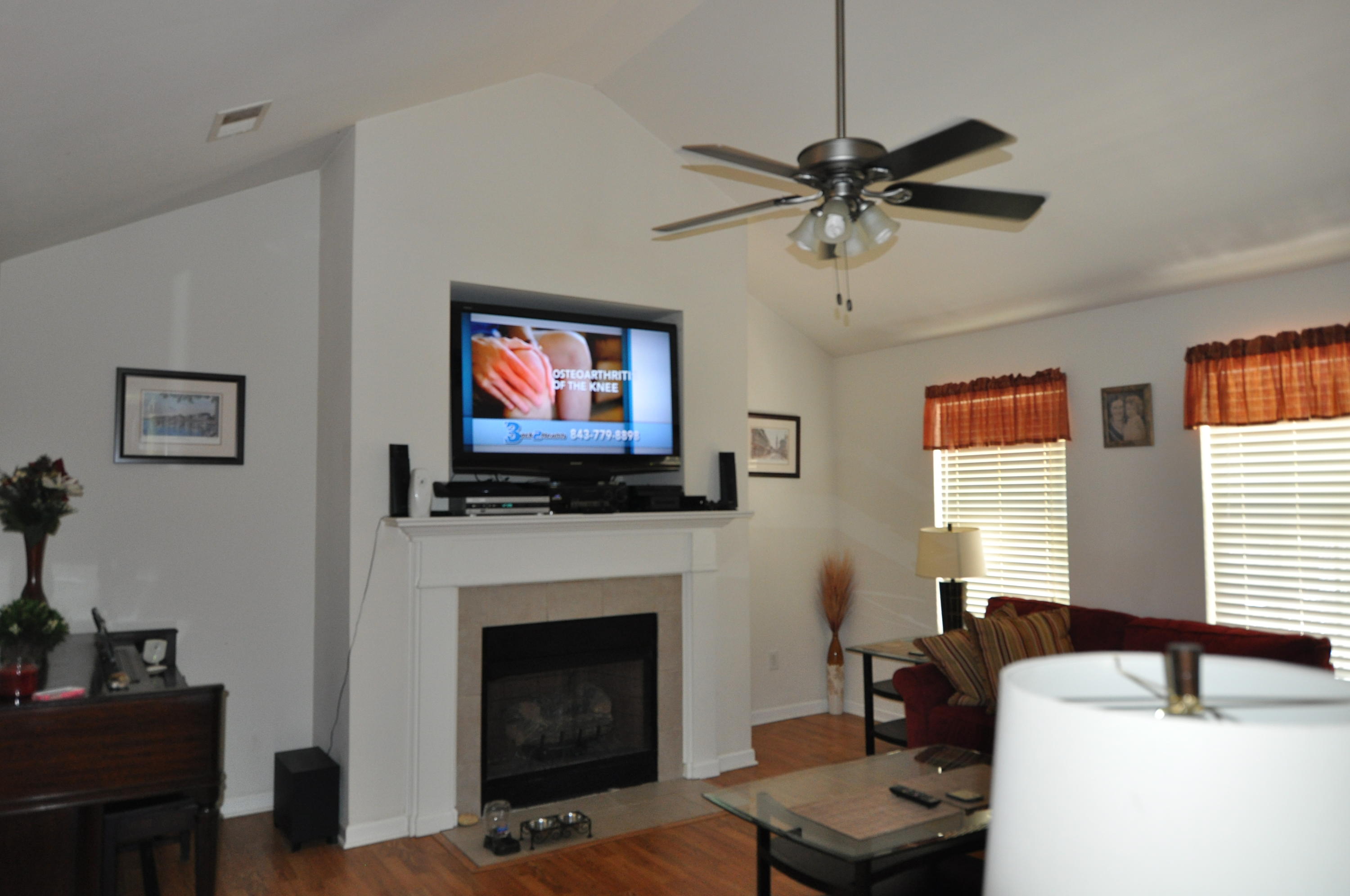 4256 Sebago Road Meggett, SC 29449 - Photo 6 of 21 living room fireplace
