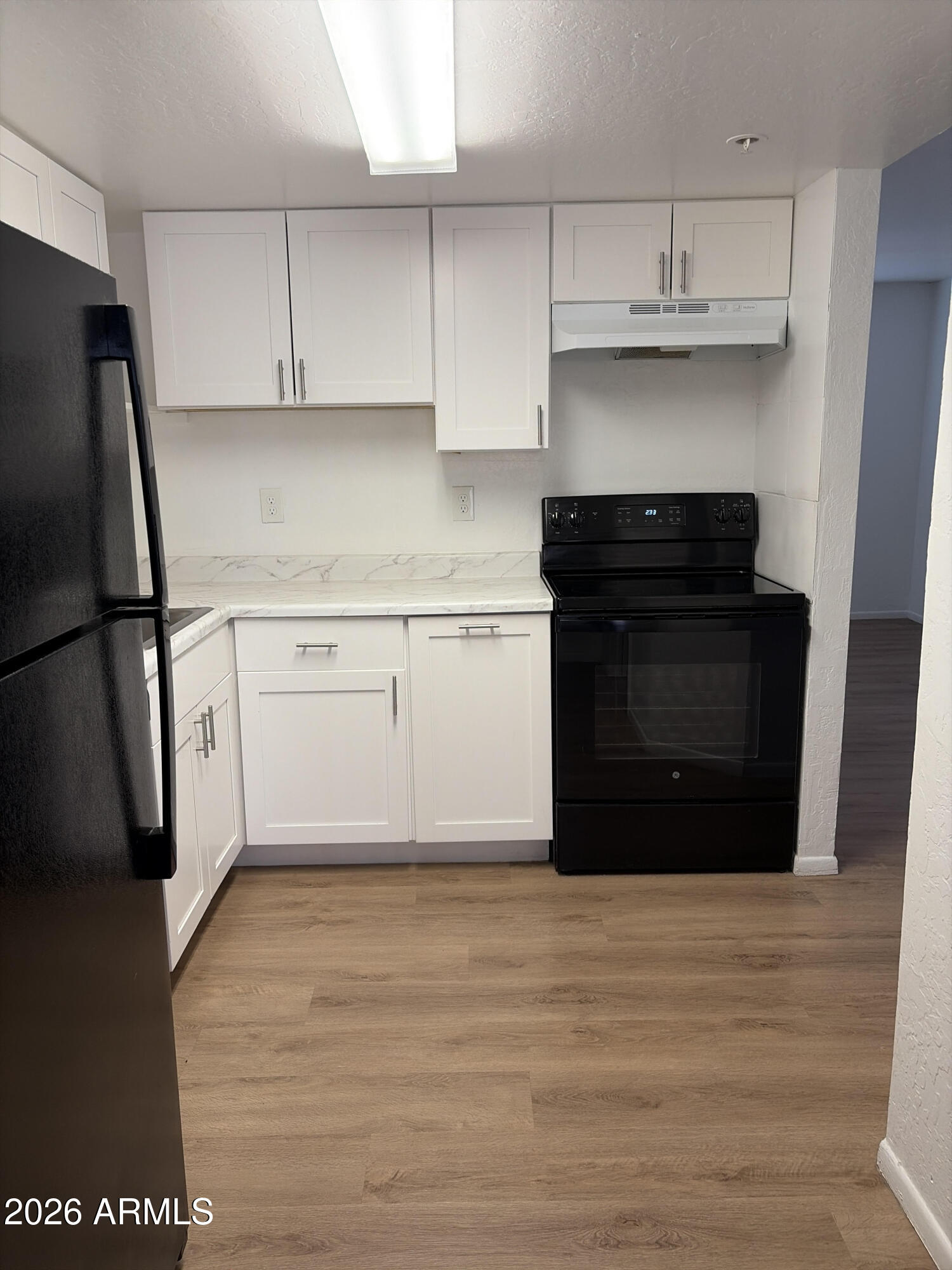 12123 West Bell Road, Unit 125 Surprise, AZ 85378 - Photo 23 of 39 Kitchen