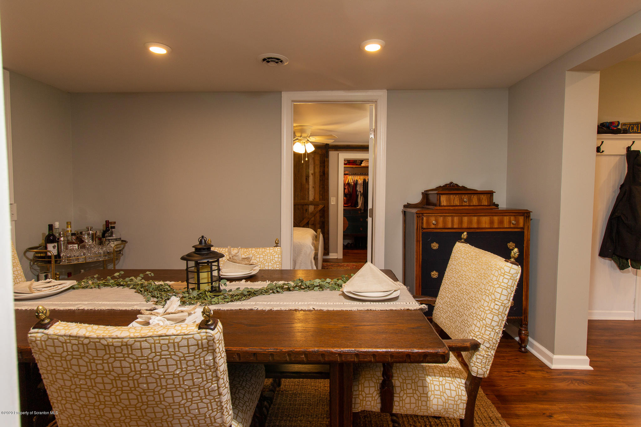 511 Meshoppen Creek Road Meshoppen, PA 18630 - Photo 12 of 30 a dining room with furniture and wooden floor