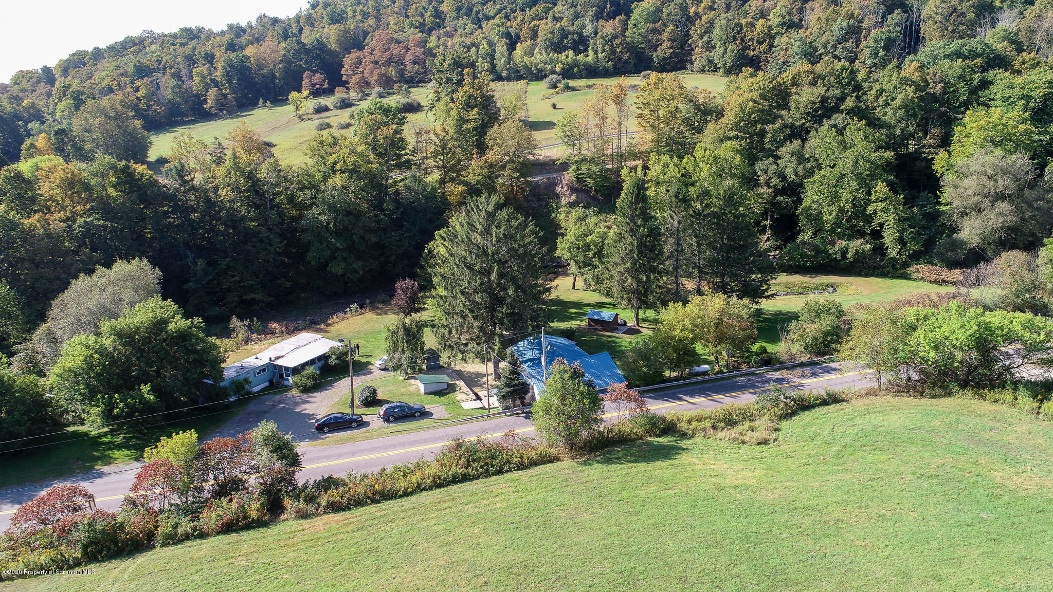 511 Meshoppen Creek Road Meshoppen, PA 18630 - Photo 4 of 30 an aerial view of residential house with outdoor space and trees all around