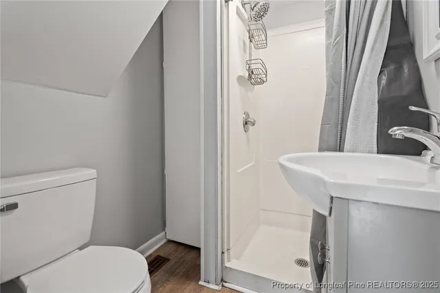 a bathroom with a sink and toilet