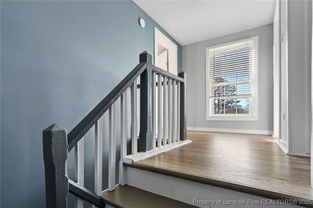 a view of entryway with wooden floor