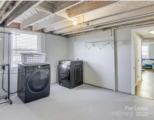 a utility room with dryer and washer