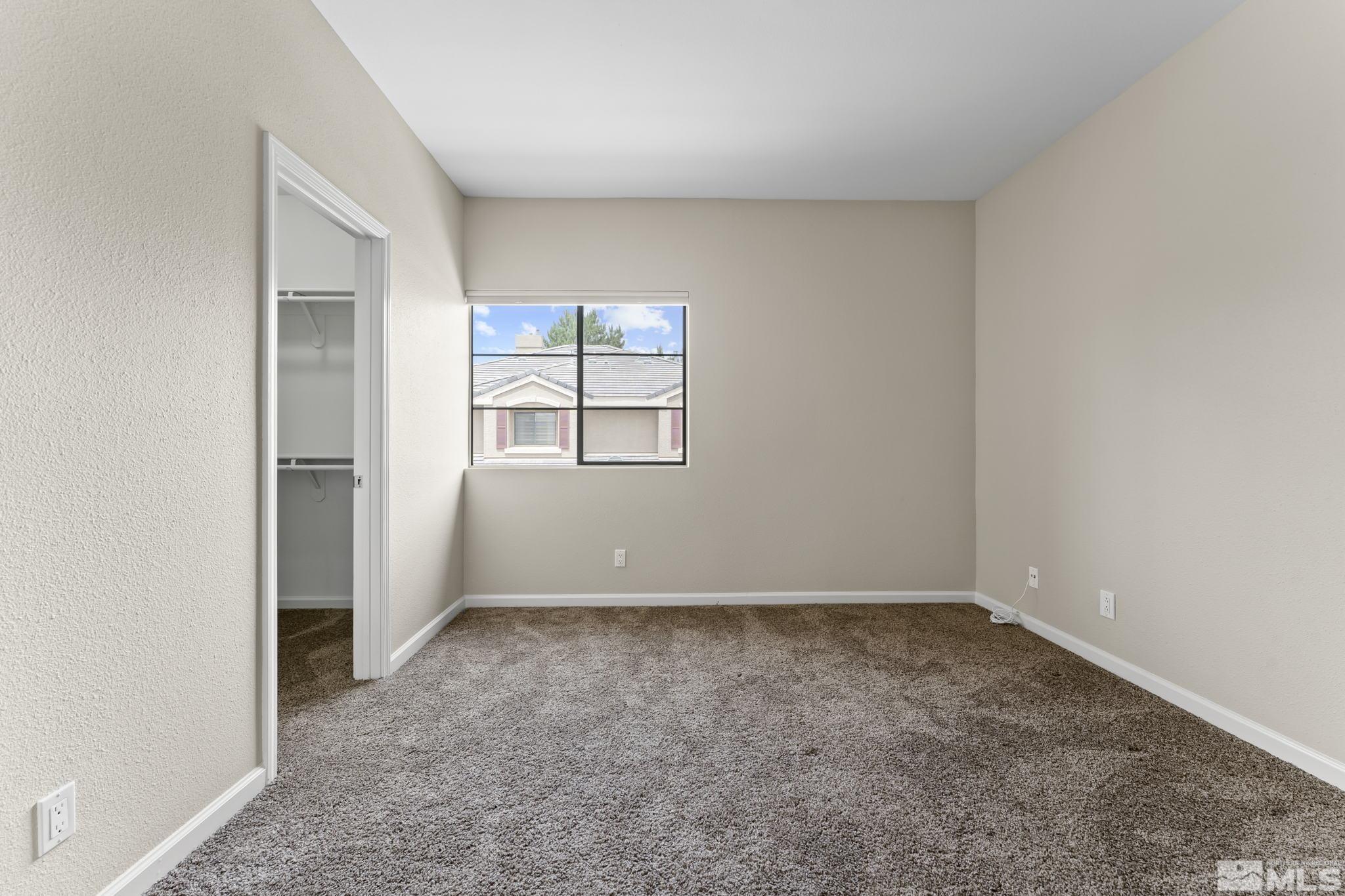900 South Meadows Parkway, Unit 321 Reno, NV 89521 - Photo 11 of 40 an empty room with windows