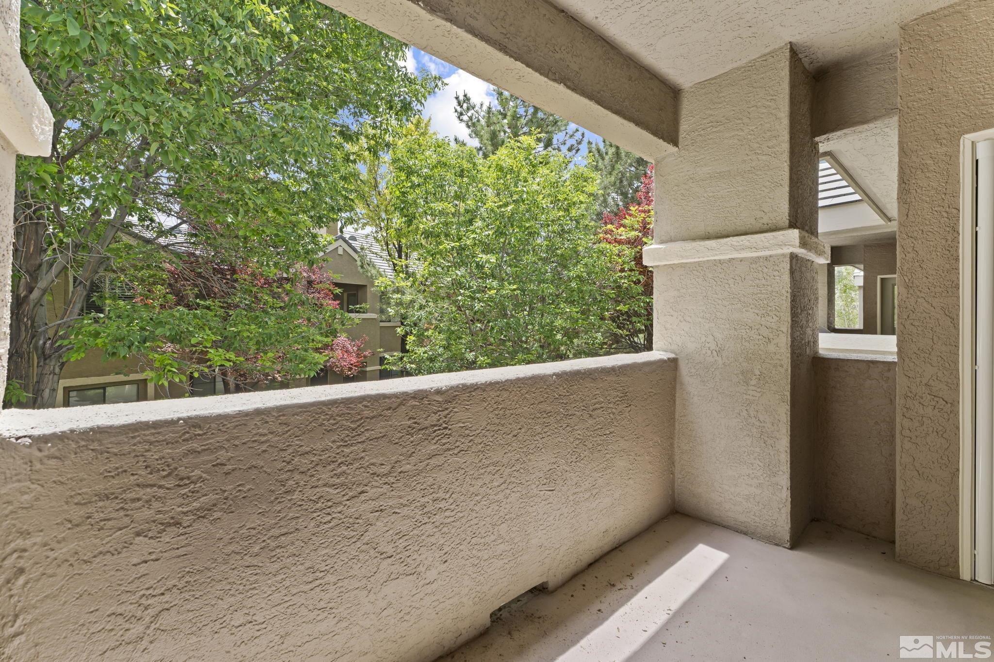 900 South Meadows Parkway, Unit 321 Reno, NV 89521 - Photo 3 of 40 a view of outdoor space and garden