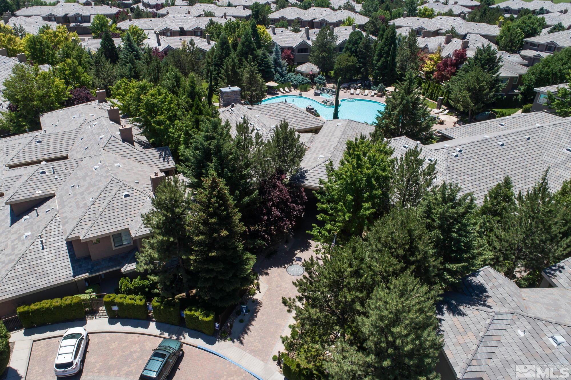 900 South Meadows Parkway, Unit 321 Reno, NV 89521 - Photo 40 of 40 an aerial view of multiple houses with yard