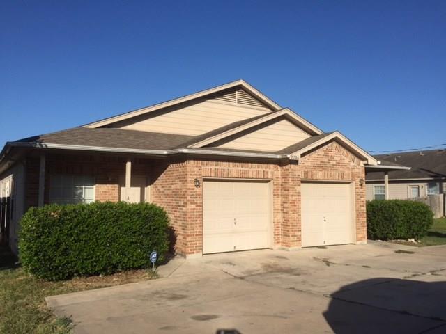 2206 South Bagdad Road, Unit B Leander, TX 78641 - Photo 1 of 13 A classic brick and siding duplex with individual garage access awaits.