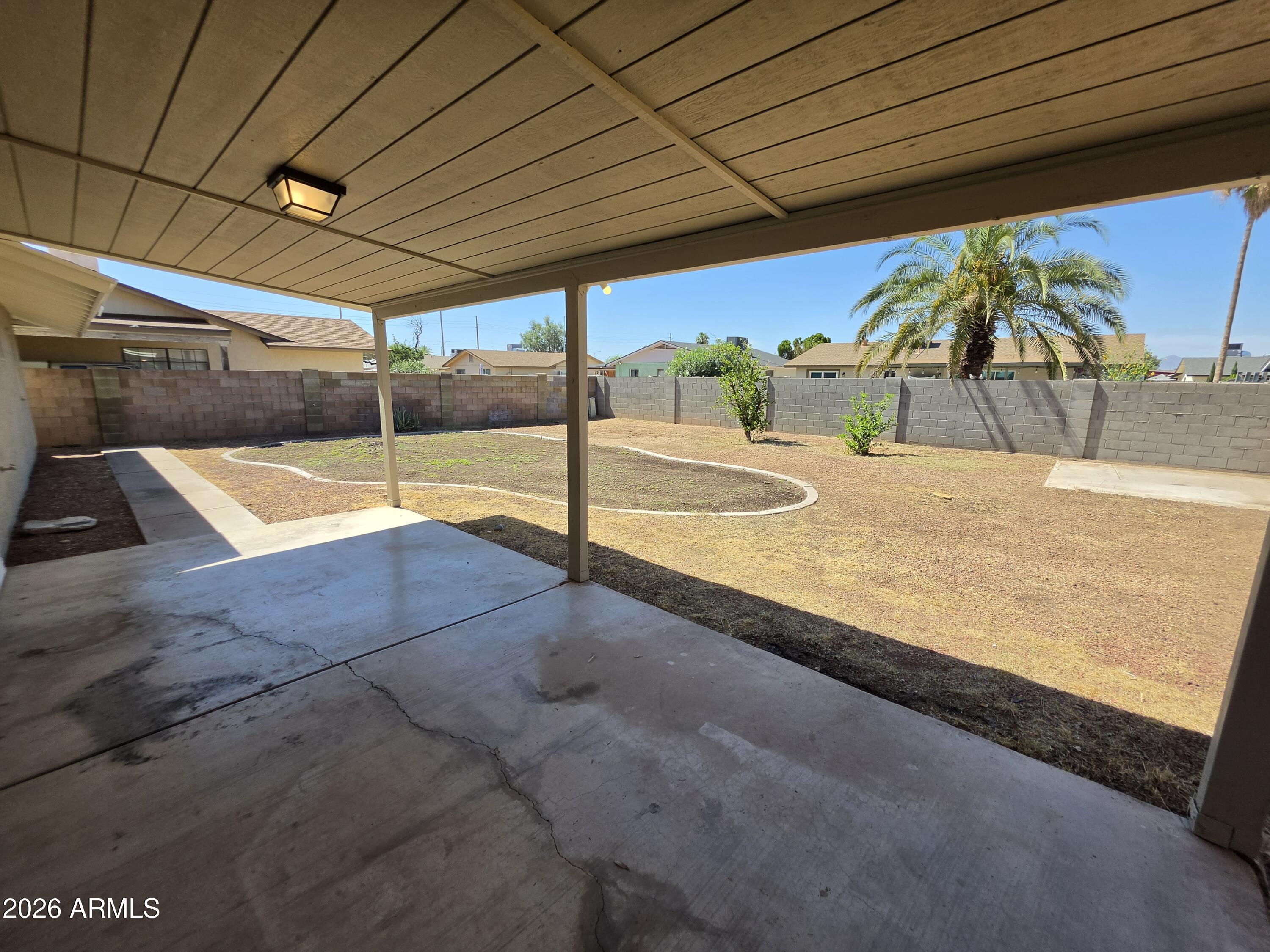 46 East McLellan Road Mesa, AZ 85201 - Photo 15 of 18 a view of a backyard