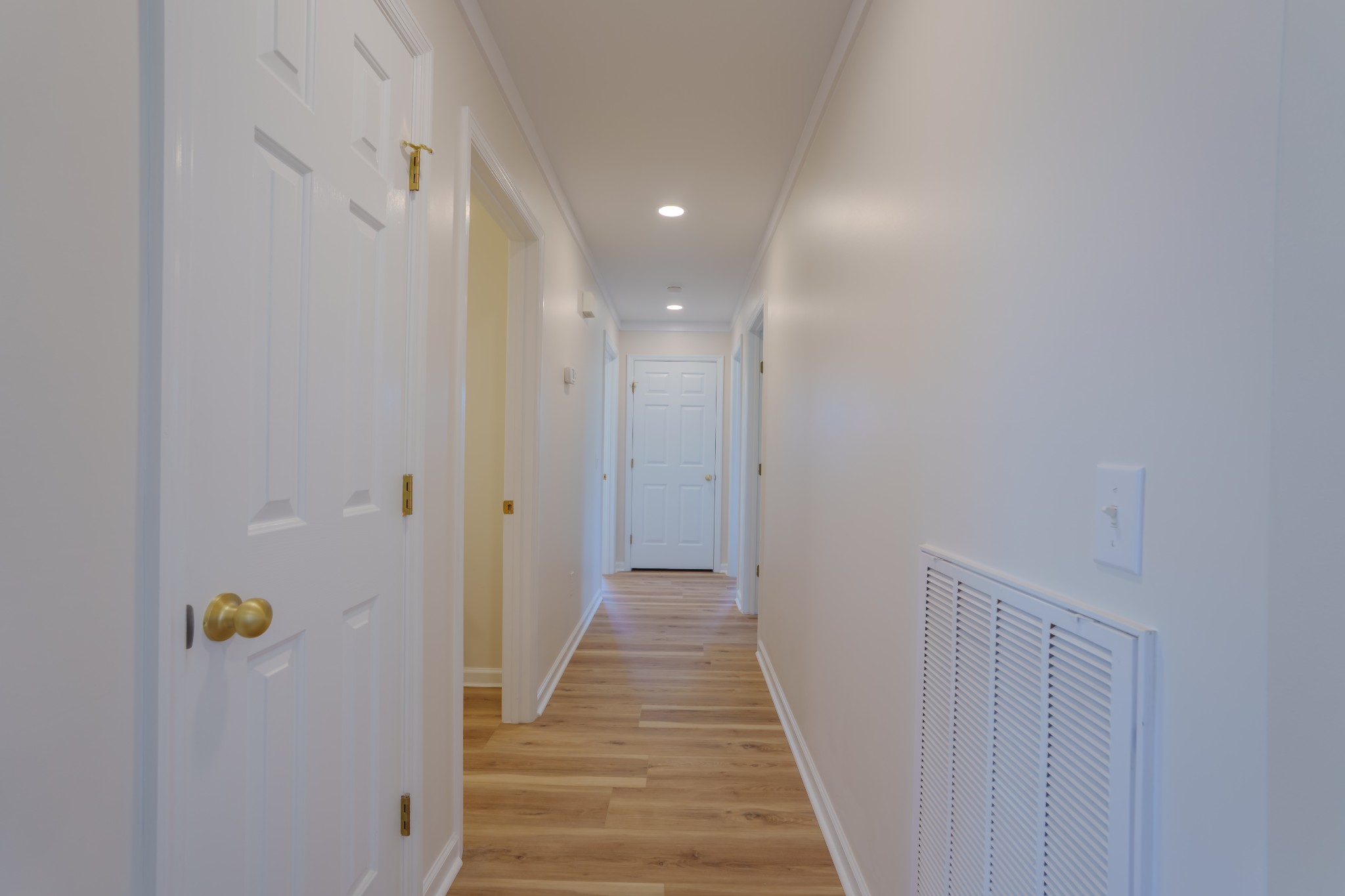 105 Peppertown Road Loretto, TN 38469 - Photo 15 of 37 a view of a hallway with wooden floor