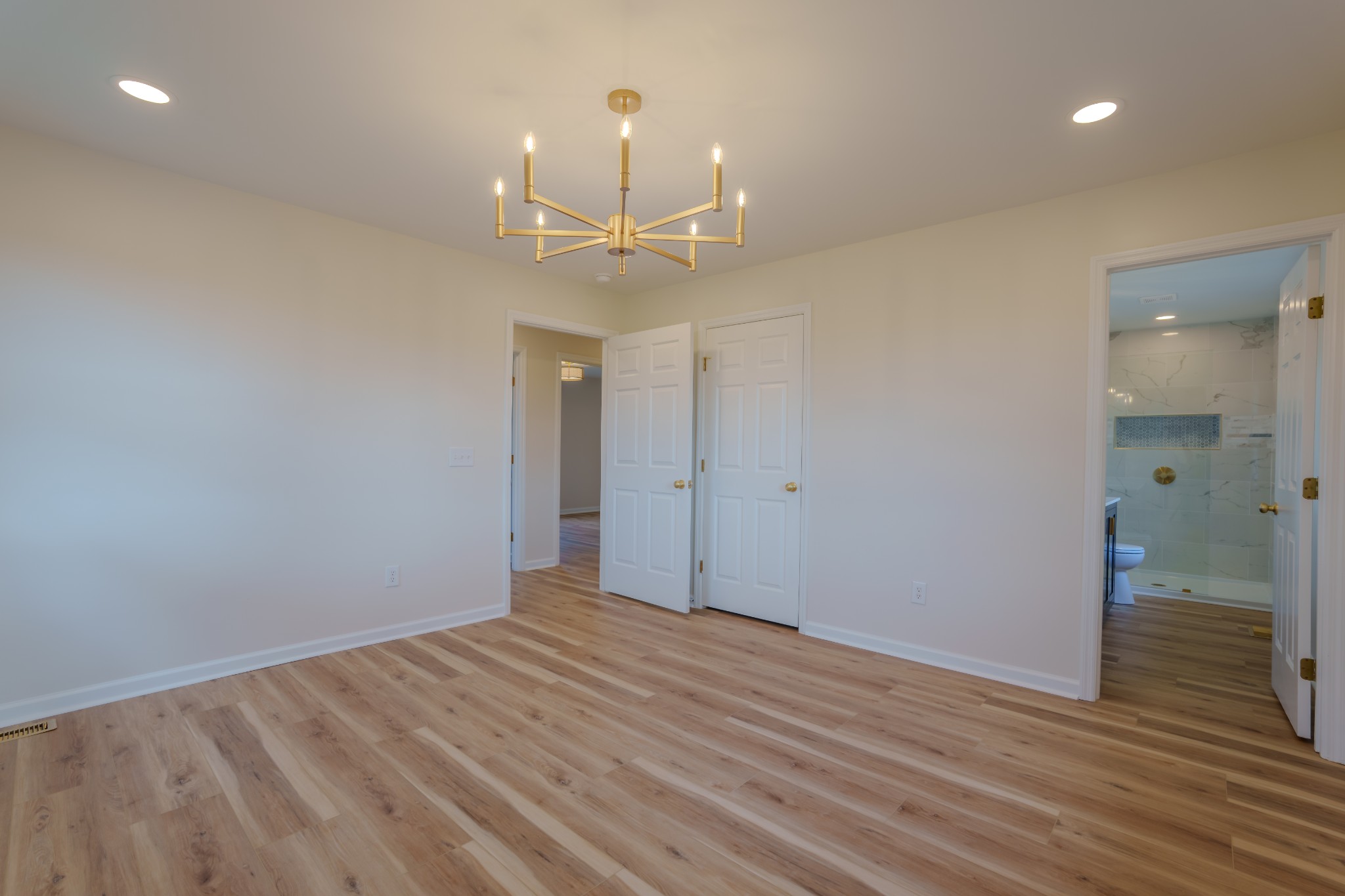 105 Peppertown Road Loretto, TN 38469 - Photo 23 of 37 wooden floor in an empty room with a window
