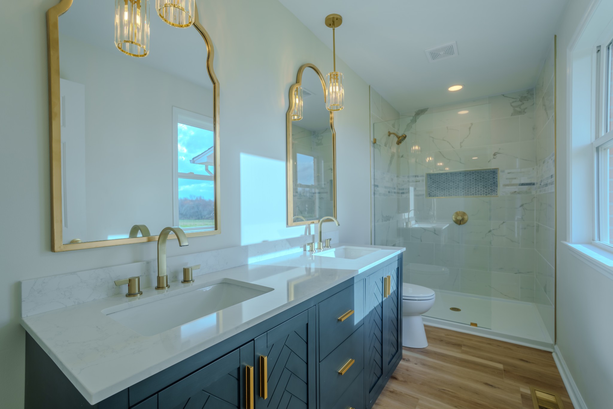105 Peppertown Road Loretto, TN 38469 - Photo 24 of 37 a bathroom with a sink double vanity granite and shower