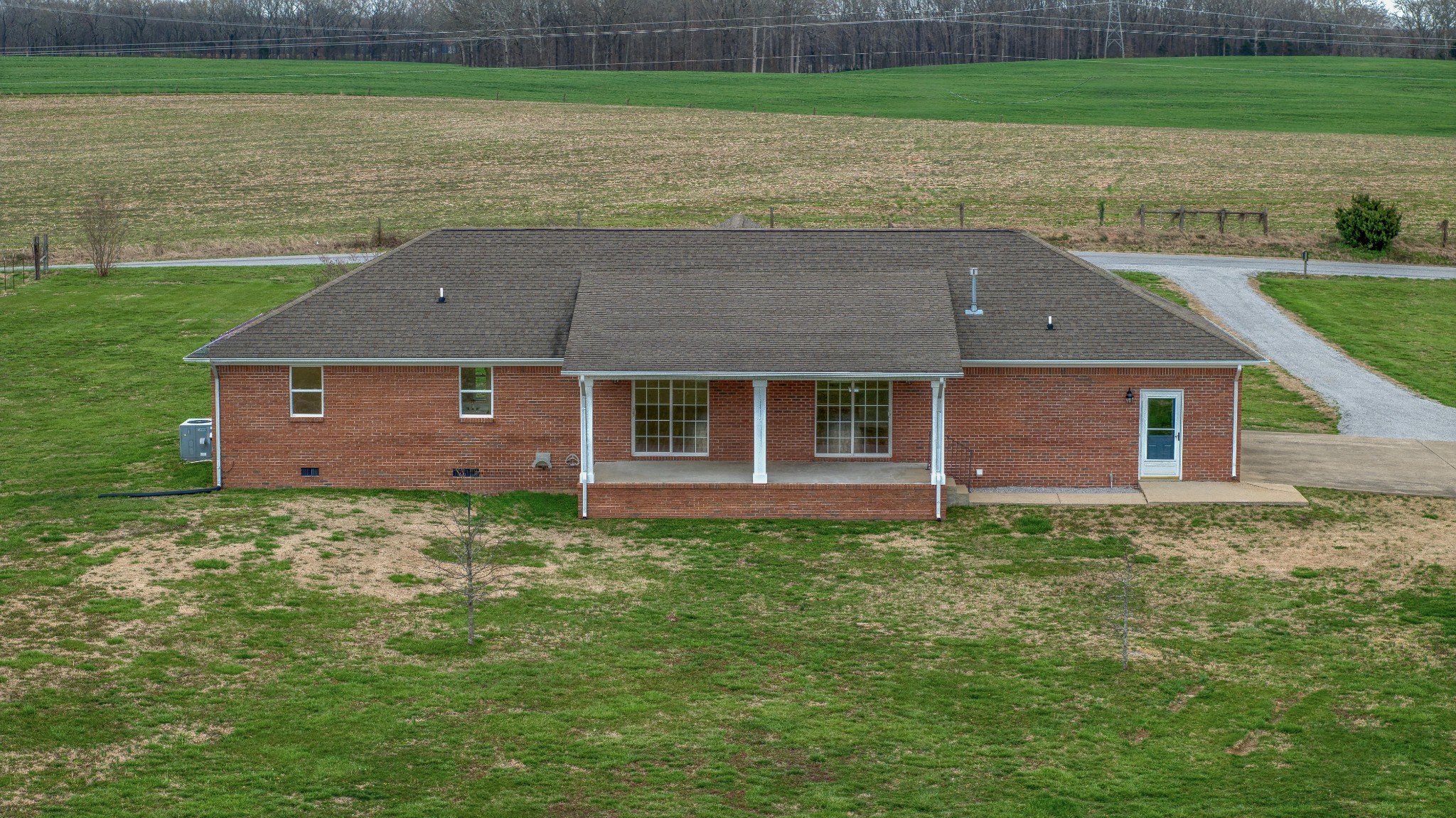 105 Peppertown Road Loretto, TN 38469 - Photo 29 of 37 a view of a house with a yard and a large tree