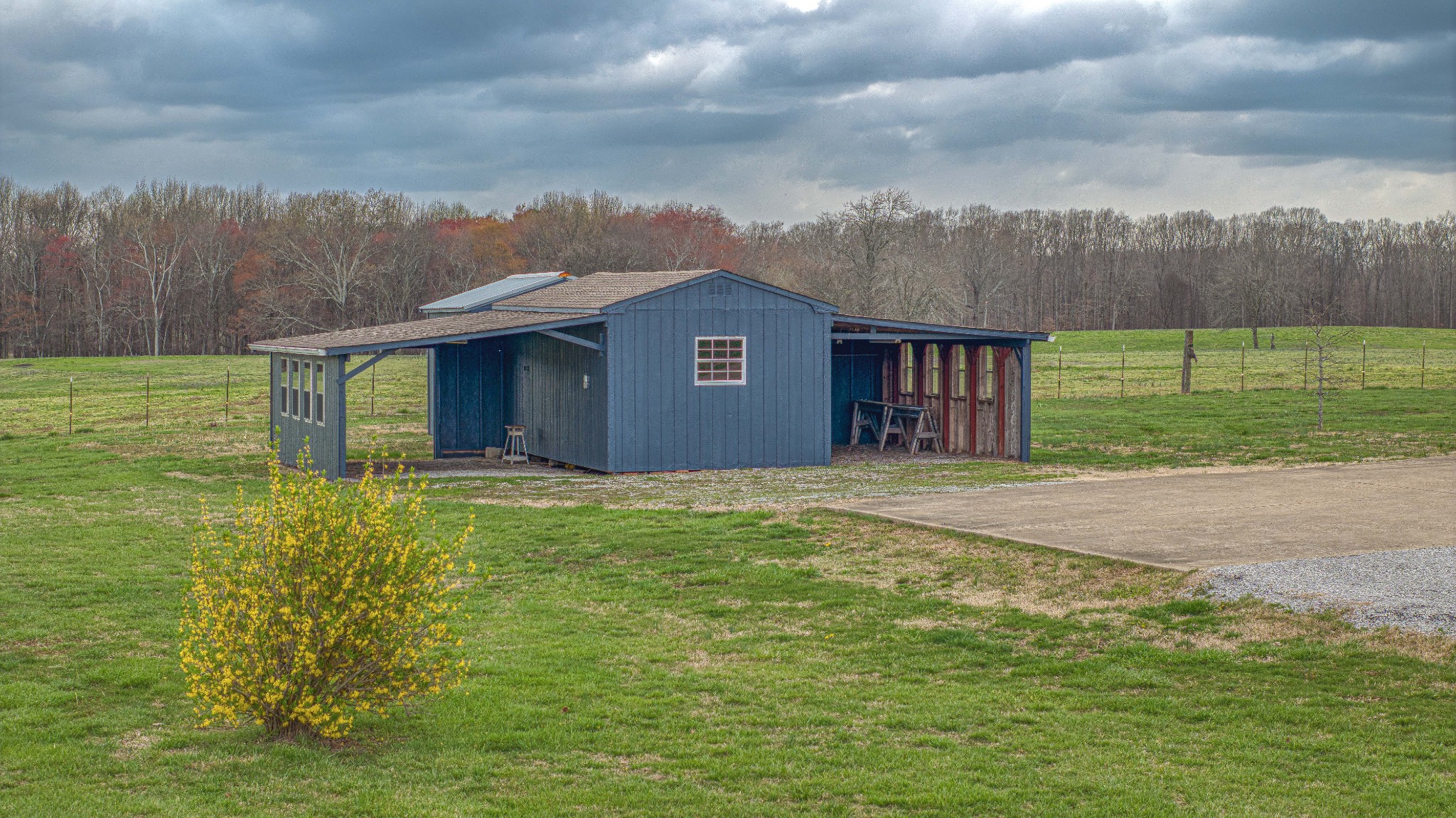 105 Peppertown Road Loretto, TN 38469 - Photo 33 of 37 a view of a house with a yard and a garden