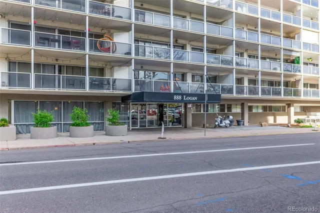 a tall building sitting on the side of a street