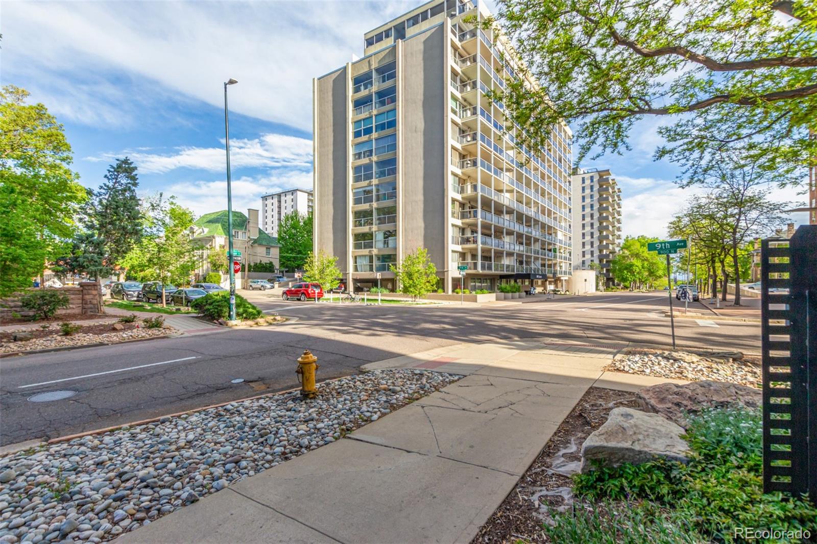 888 Logan Street, Unit 2F Denver, CO 80203 - Photo 4 of 16 a view of a street with a building