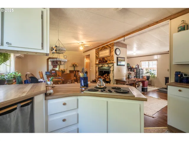a kitchen with stainless steel appliances a stove and a refrigerator