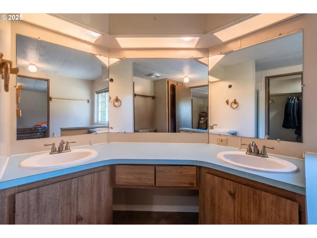 a utility room with closet dryer and washer