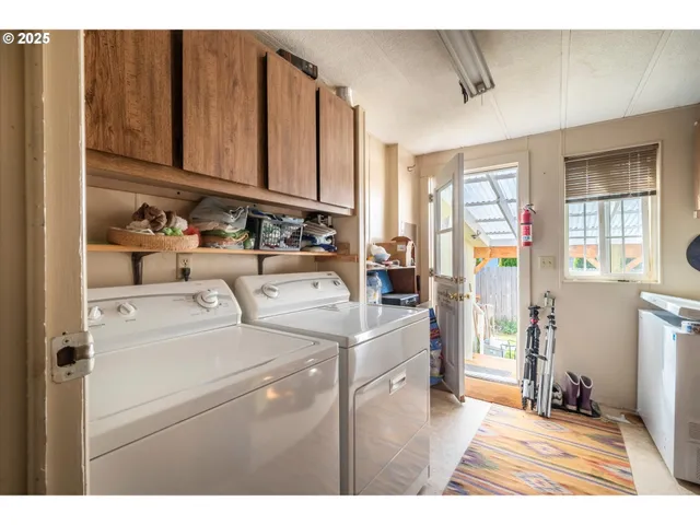 a bathroom with a sink mirror and a bath tub