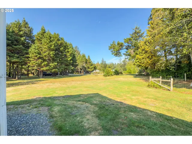 a view of an ocean and a yard