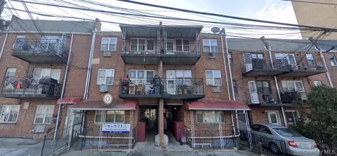 a front view of a building with street