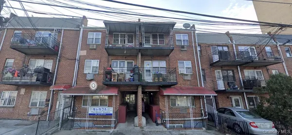 a front view of a building with street