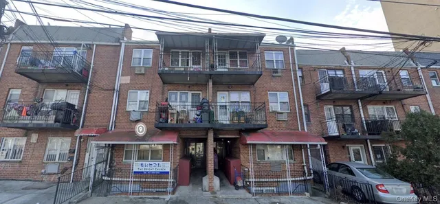 a front view of a building with street