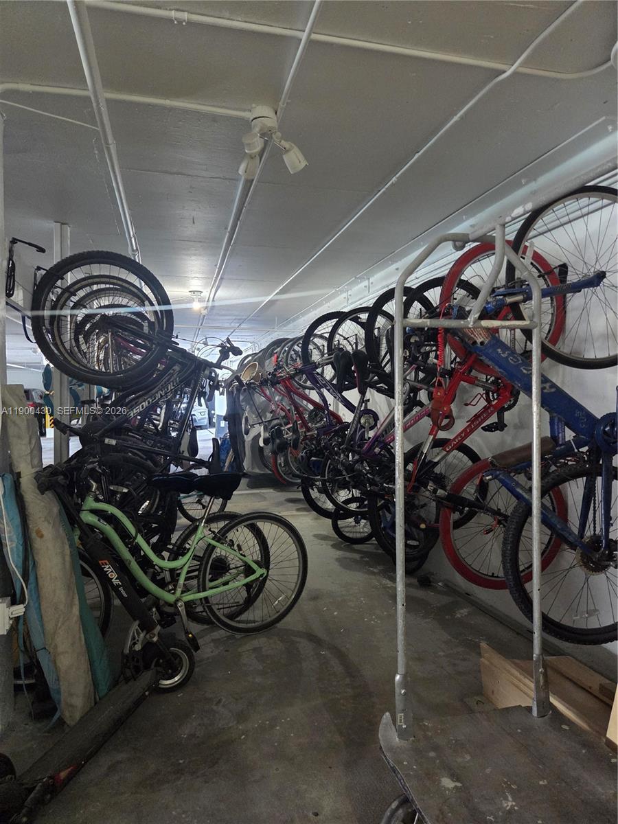 5880 Collins Avenue, Unit 806 Miami Beach, FL 33140 - Photo 29 of 30 a view of a room with gym equipment