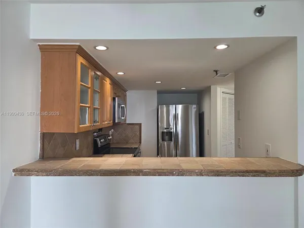 a view of a living room kitchen