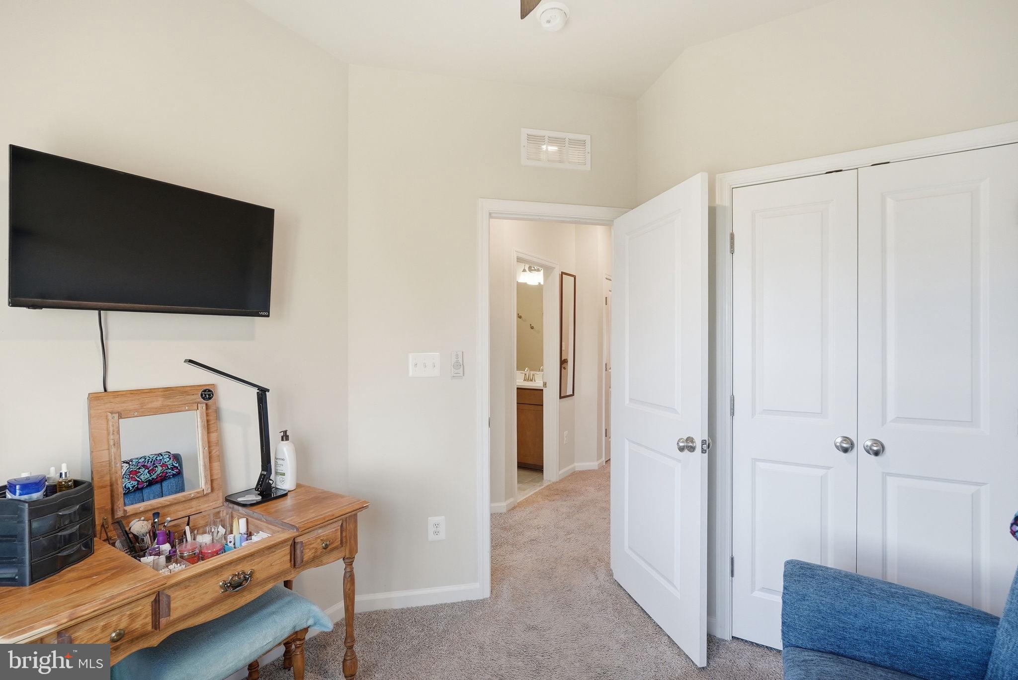 9365 Barnes Loop Manassas, VA 20110 - Photo 18 of 37 a view of room with furniture and wooden floor