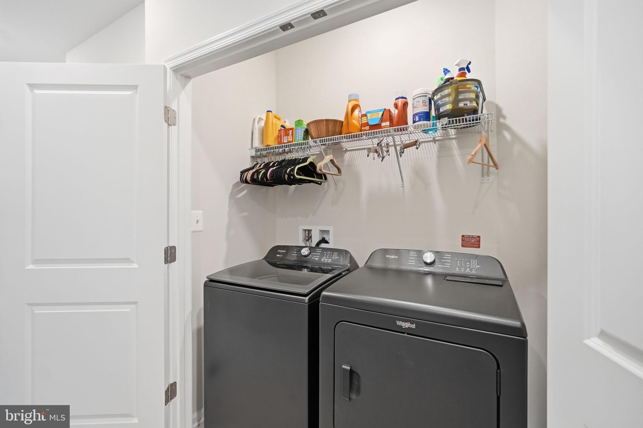 9365 Barnes Loop Manassas, VA 20110 - Photo 23 of 37 a utility room with dryer and washer